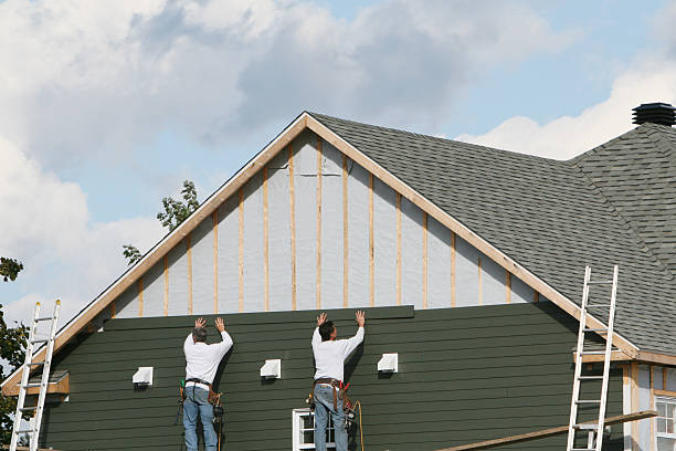 Professional Siding technician working in Dacono, CO